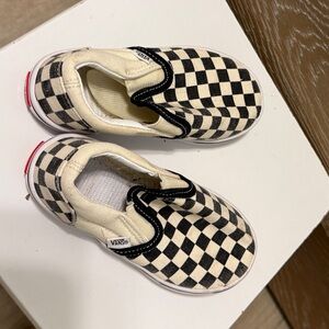 Vans Black and White Checkerboard Slip-On Sneakers